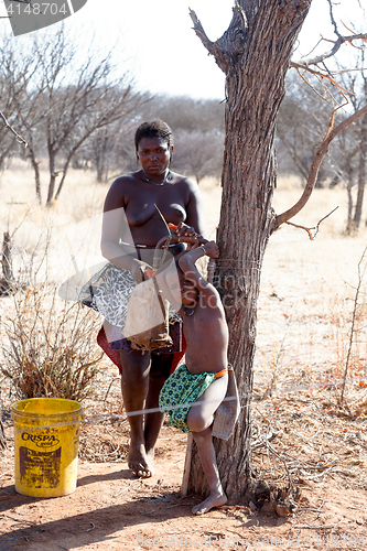 Image of Zemba woman with ornament on the neck in the village