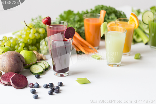 Image of glasses with different fruit or vegetable juices