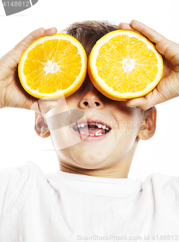 Image of little cute boy with orange fruit double isolated on white smili