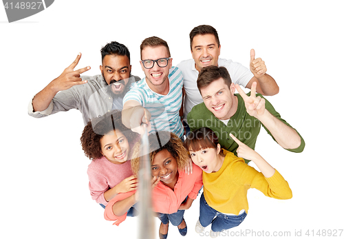 Image of international group of happy people taking selfie