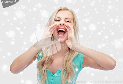 Image of young woman or teenage girl shouting