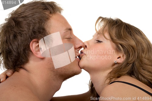 Image of Portrait of young kissing couple. Isolated on white 2