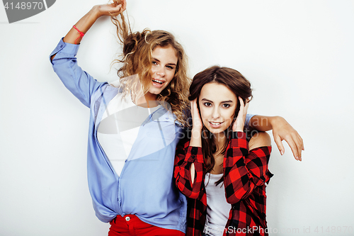 Image of two best friends teenage girls together having fun, posing emotional on white background, besties happy smiling, making selfie, lifestyle people concept