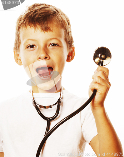 Image of little cute boy with stethoscope playing like adult profession d