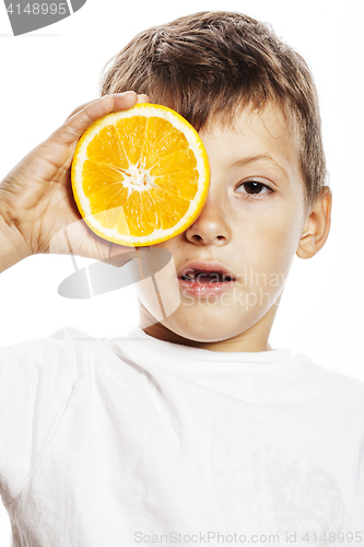 Image of little cute boy with orange fruit double isolated on white smili