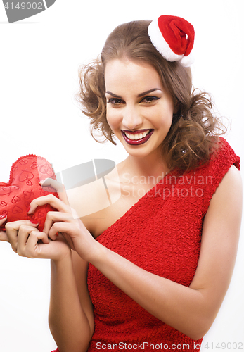 Image of young pretty happy smiling brunette woman on christmas in santas