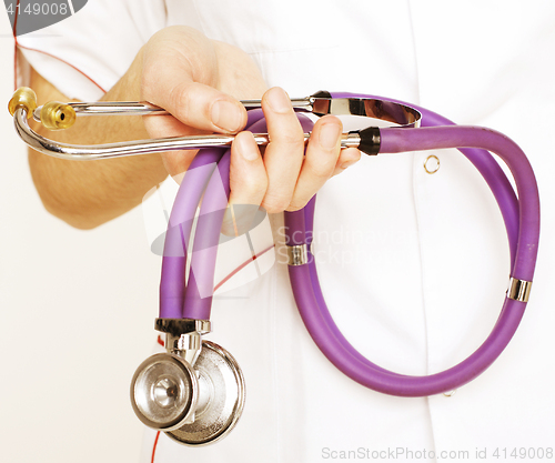 Image of Close-up of female doctor using stethoscope