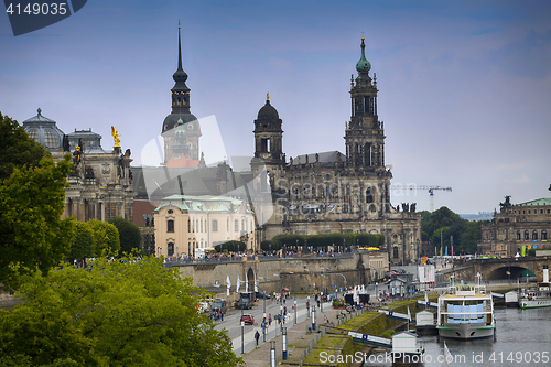 Image of DRESDEN, GERMANY – AUGUST 13, 2016: Tourists walk and majestic