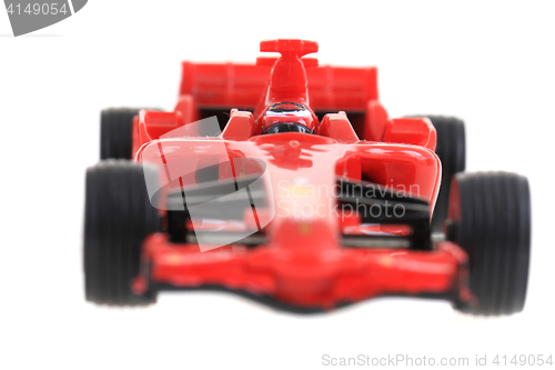 Image of red toy as formula car