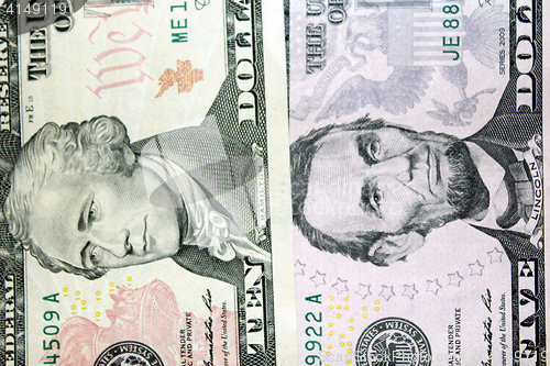 Image of dollar banknotes 5 and 10