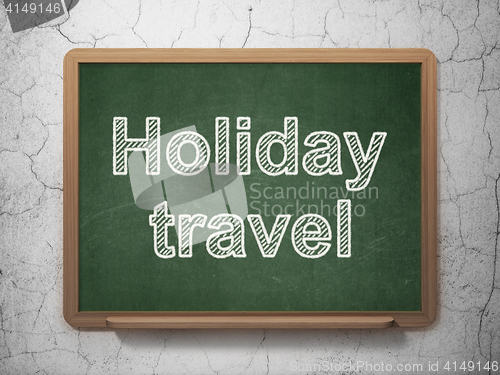 Image of Travel concept: Holiday Travel on chalkboard background