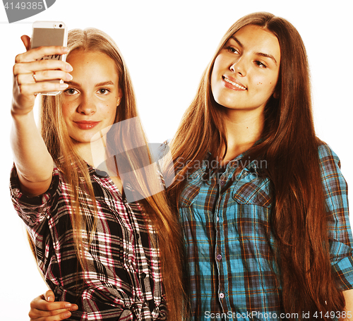 Image of cute teenage girls making selfie isolated