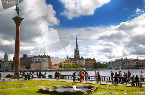 Image of STOCKHOLM, SWEDEN - AUGUST 19, 2016: Tourists walk and visit Sto