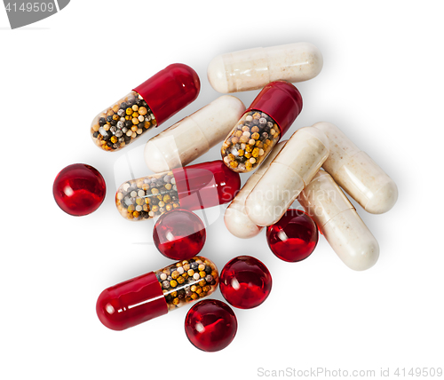 Image of Scattered pills and capsules different color
