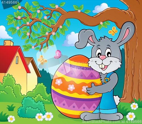 Image of Bunny holding big Easter egg theme 3