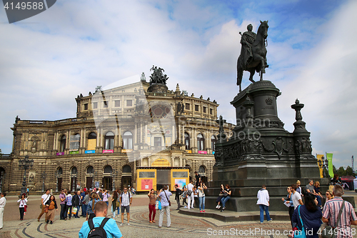 Image of DRESDEN, GERMANY – AUGUST 13, 2016: Tourists walk and visit on