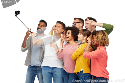 Image of group of people taking selfie by smartphone
