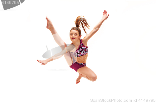 Image of The teenager girl doing gymnastics exercises isolated on white background