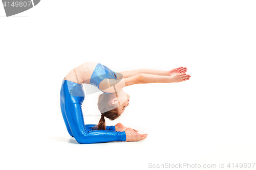 Image of The teenager girl doing gymnastics exercises isolated on white background