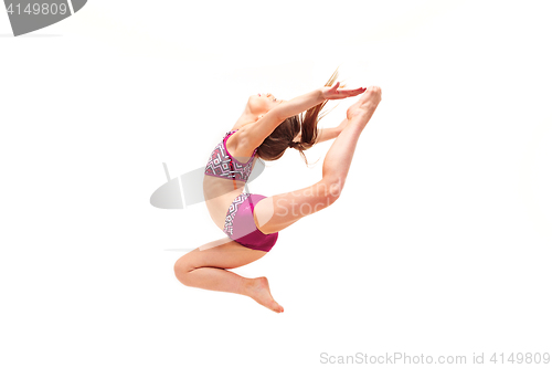 Image of The teenager girl doing gymnastics exercises isolated on white background