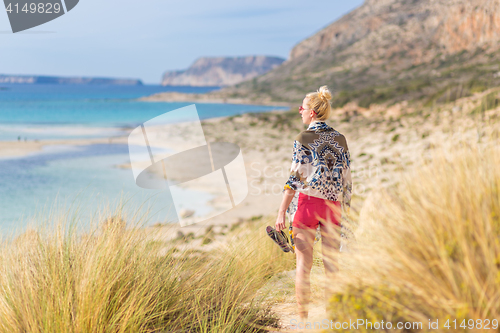 Image of Free Happy Woman Enjoying Sun on Vacations.