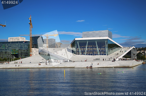 Image of OSLO, NORWAY – AUGUST 17, 2016: Tourist on the Oslo Opera Hous