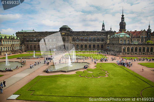 Image of DRESDEN, GERMANY – AUGUST 13, 2016: Tourists walk and visit Dr