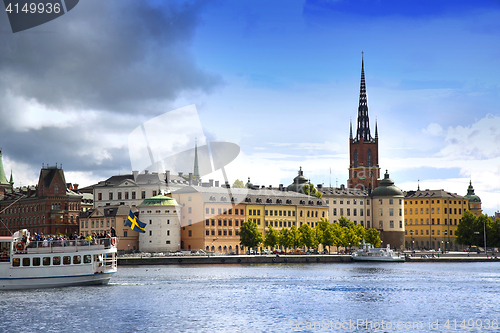 Image of STOCKHOLM, SWEDEN - AUGUST 19, 2016: Tourists boat and View of G