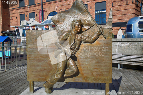 Image of OSLO, NORWAY – AUGUST 17, 2016: Bronze statue, man running wit