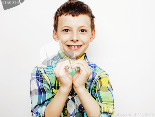 Image of young pretty little boy kid wondering, posing emotional face isolated on white background, gesture happy smiling close up, lifestyle people concept