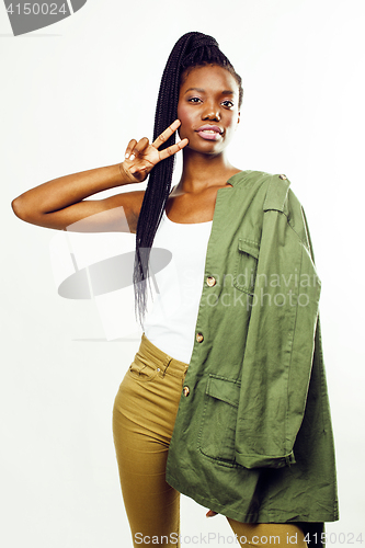 Image of young pretty african-american girl posing cheerful emotional on white background isolated, lifestyle people concept