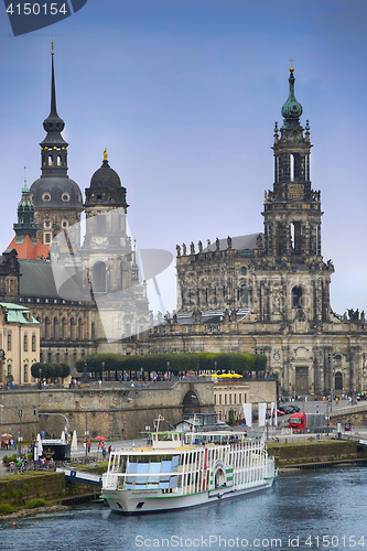 Image of DRESDEN, GERMANY – AUGUST 13, 2016: Tourists walk and majestic