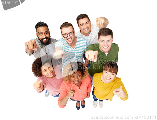 Image of international group of people pointing on you