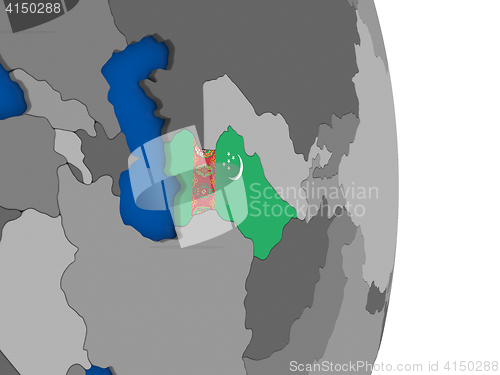 Image of Turkmenistan on globe with flag