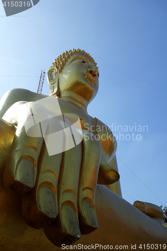 Image of Golden Buddha statue of Big Buddha over blue sky