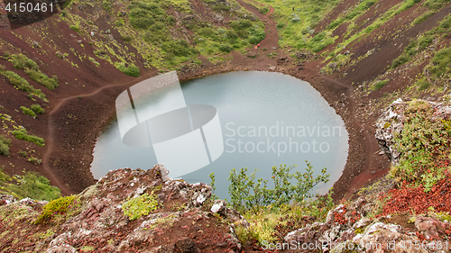 Image of Kerid is a crater lake of a turquoise color - Iceland
