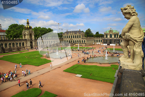 Image of DRESDEN, GERMANY – AUGUST 13, 2016: Tourists walk and visit Dr