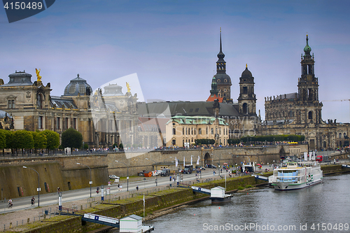 Image of DRESDEN, GERMANY – AUGUST 13, 2016: Tourists walk and majestic