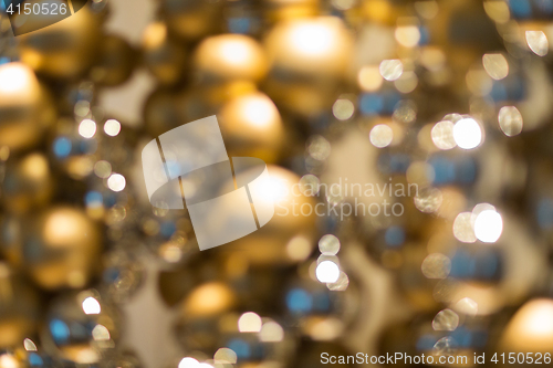 Image of golden christmas decoration or garland of beads