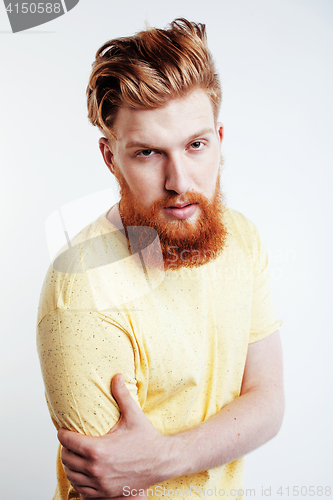 Image of young handsome hipster ginger bearded guy looking brutal isolated on white background, lifestyle people concept