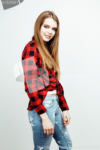 Image of young pretty stylish hipster teen blond girl posing emotional isolated on white background happy smiling cool smile, lifestyle people concept