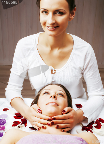 Image of stock photo attractive lady getting spa treatment in salon, heal