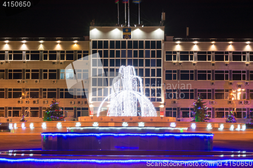 Image of Anapa, Russia - January 7, 2017: Night landscape with a view of the administration of the city of Anapa resort and the fountain in front of it in the New Year holidays