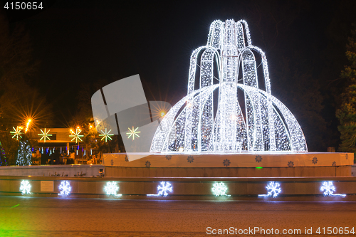 Image of Anapa, Russia - January 7, 2017: Night landscape with a view of the administration of the city of Anapa resort and the fountain in front of it in the New Year holidays
