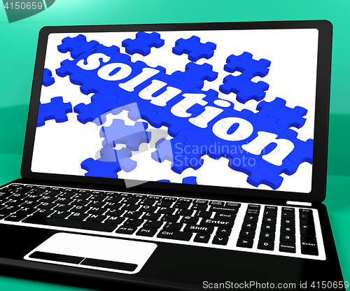 Image of Solution Puzzle On Notebook Showing Computer Applications