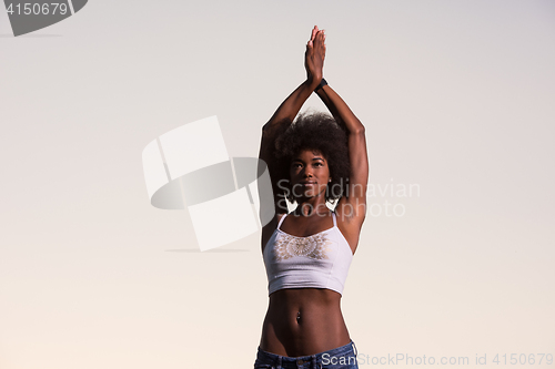 Image of young black woman in nature