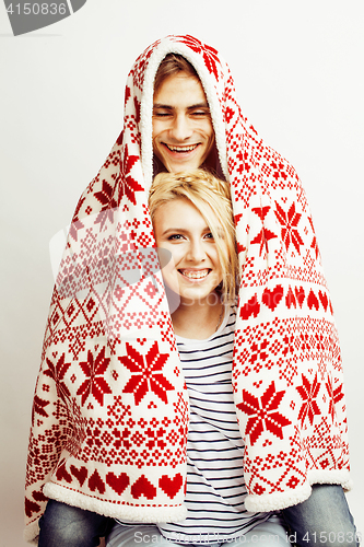 Image of young pretty teenage couple, hipster guy with his girlfriend happy smiling and hugging isolated on white background, lifestyle people concept, valentine design winter plaid