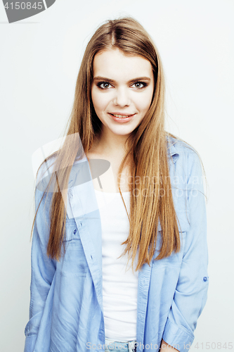 Image of young pretty stylish hipster teen blond girl posing emotional isolated on white background happy smiling cool smile, lifestyle people concept