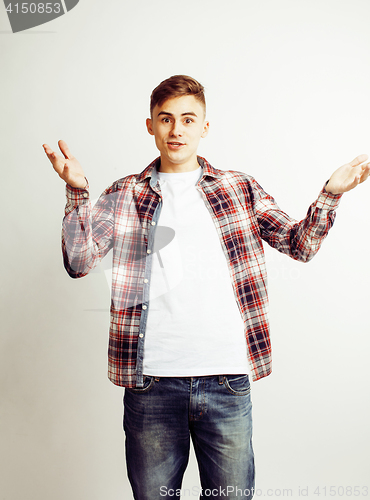 Image of young handsome teenage hipster guy posing emotional, happy smiling against white background isolated, lifestyle people concept