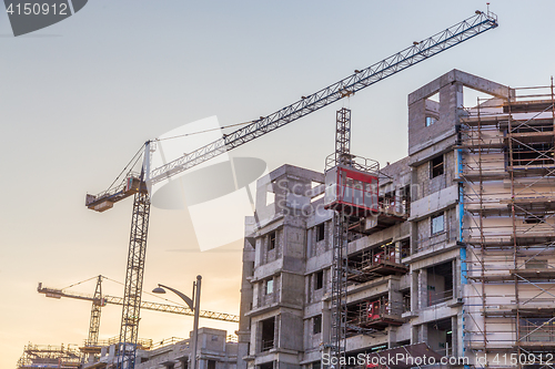 Image of Modern building constraction site works.